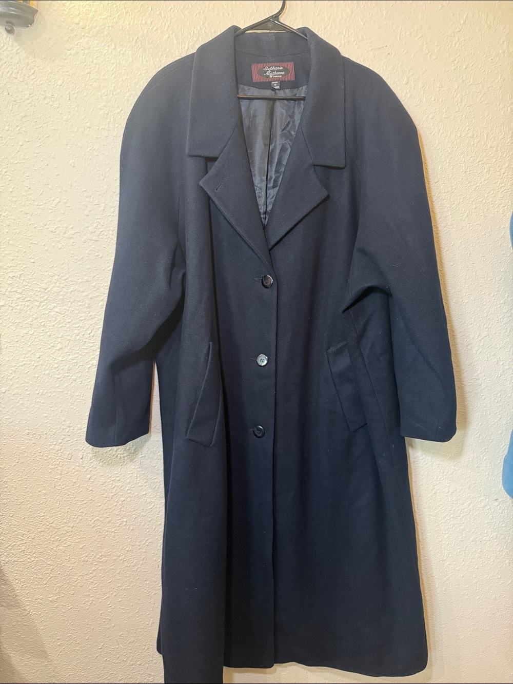 Stephanie Mathew’s wool dark blue women’s long coat